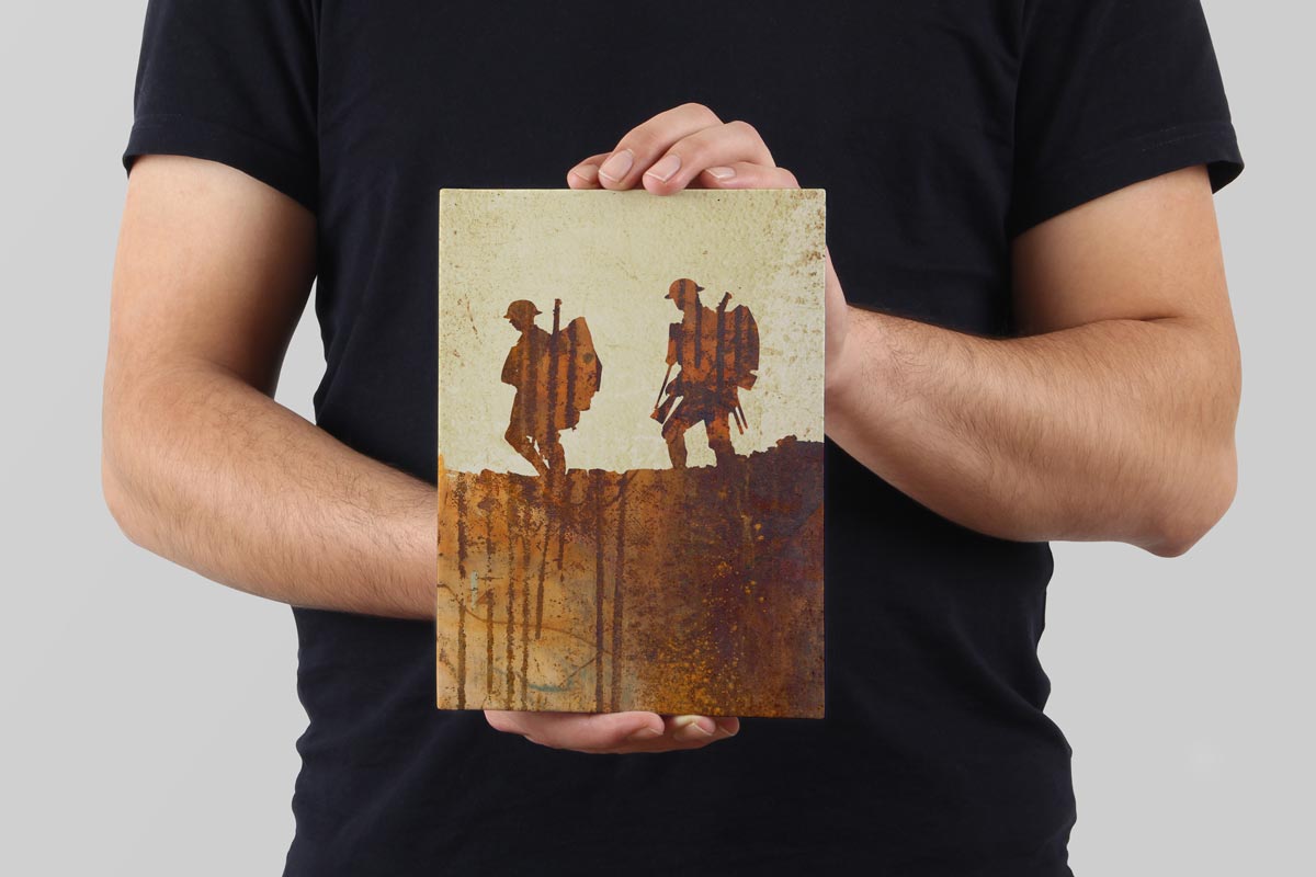Model holds a WW1-inspired illustration, printed on aluminium