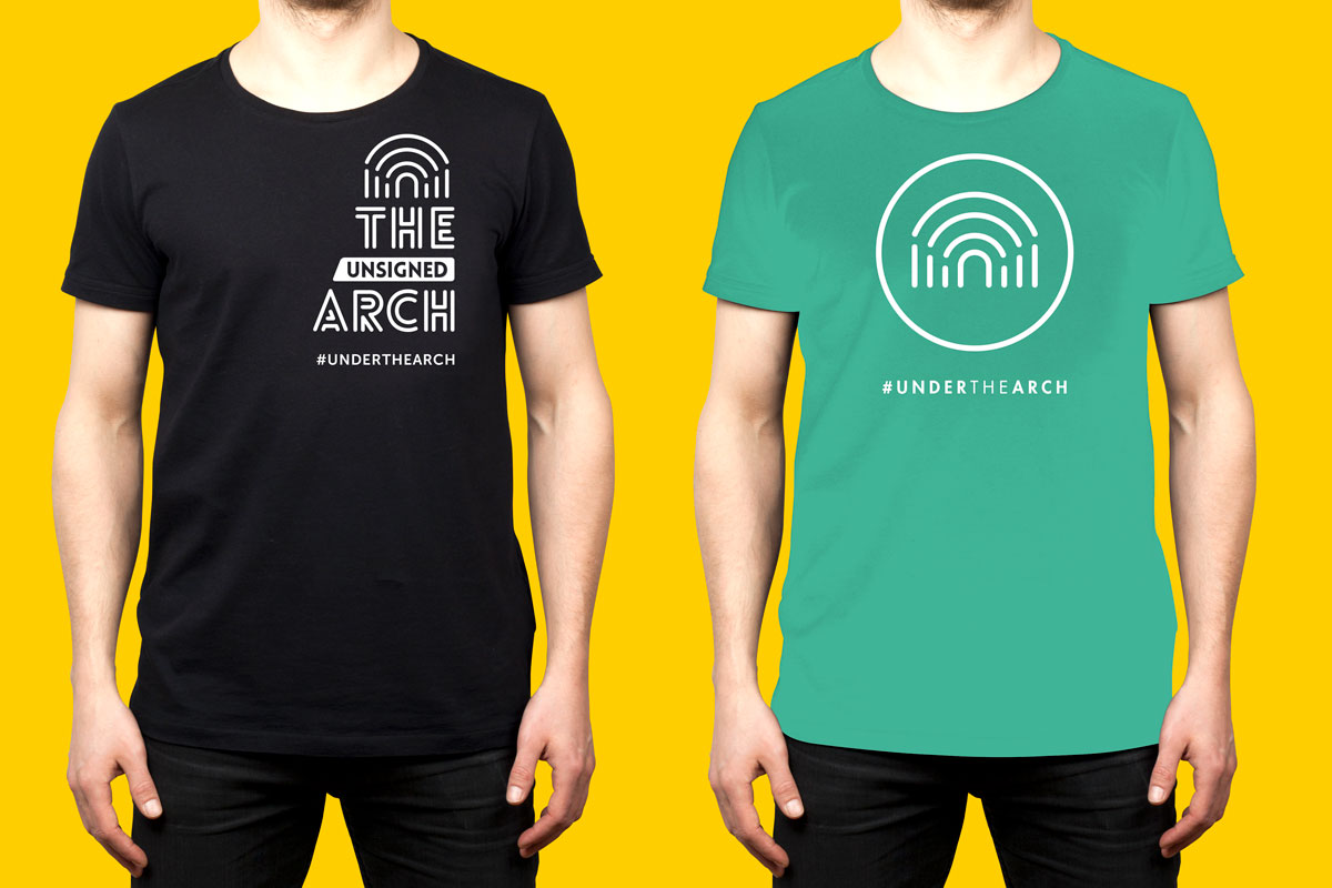 Model wears The Unsigned Arch t-shirt design