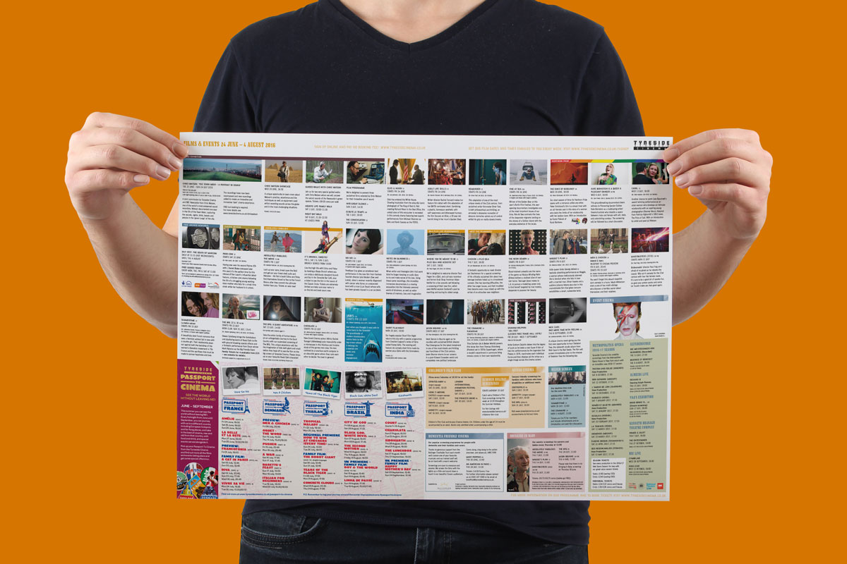 Model holds an opened Tyneside Cinema brochure