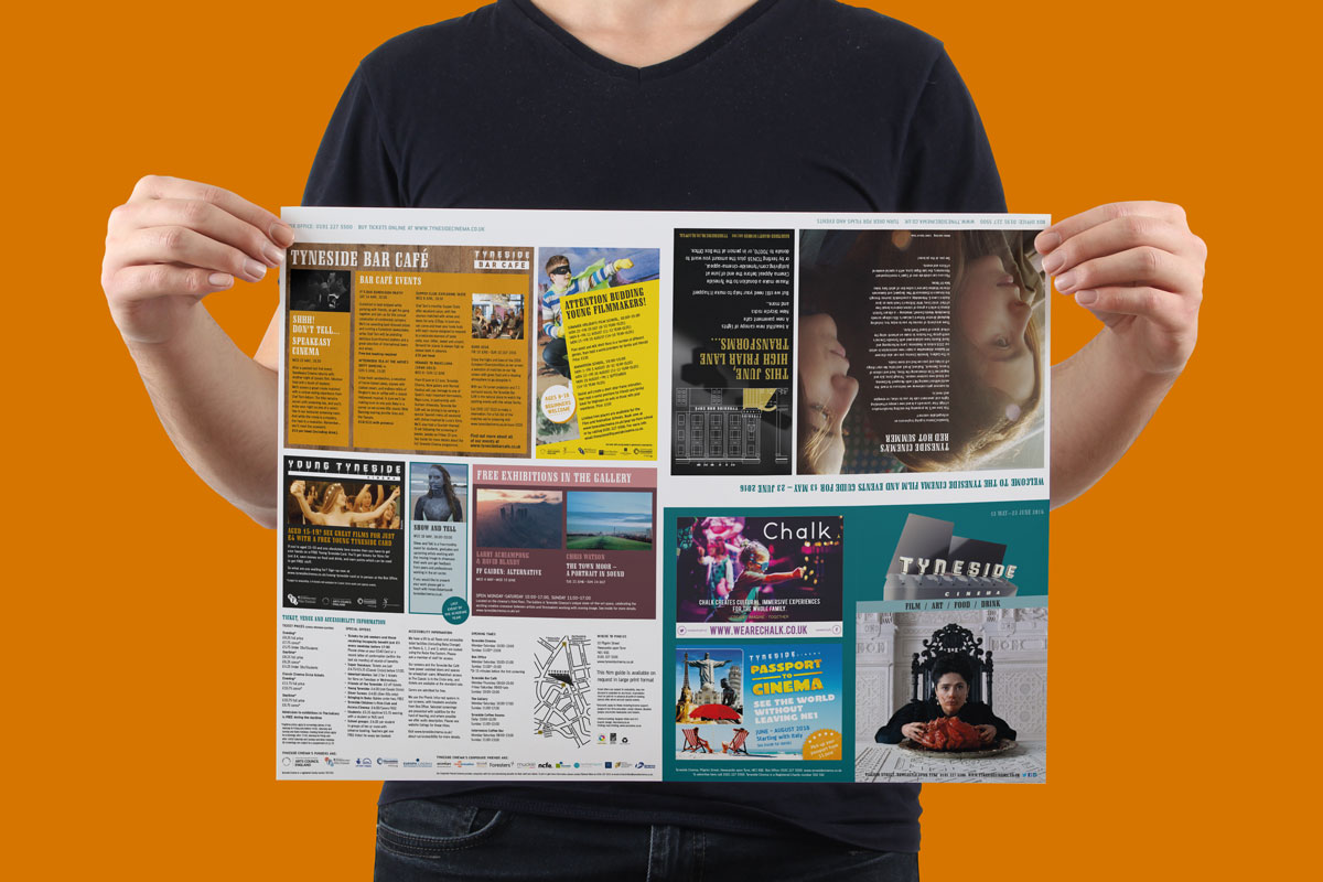 Model holds an opened Tyneside Cinema brochure