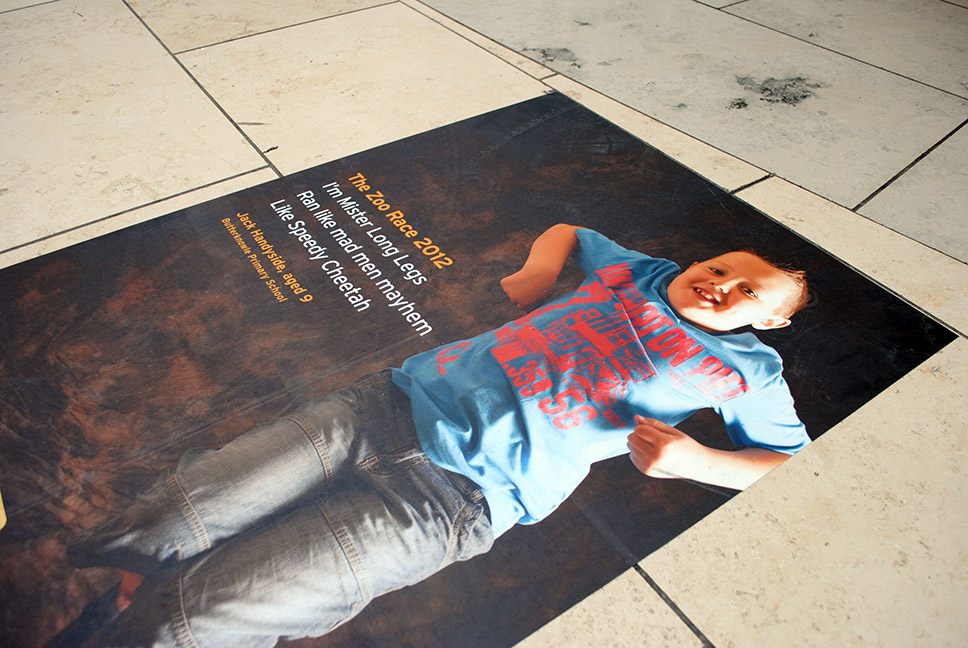 Poetry on the Move poster design on display at the Metro Centre, Gateshead