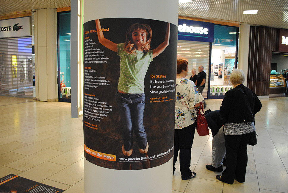 Poetry on the Move poster design on display at the Metro Centre, Gateshead