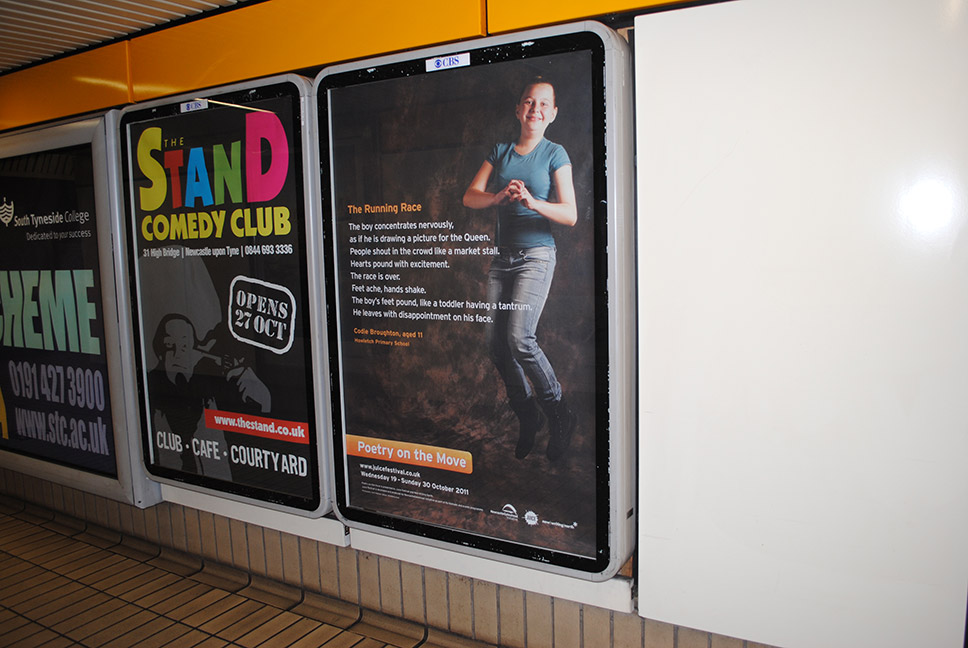 Poetry on the Move poster design on display in a Metro station